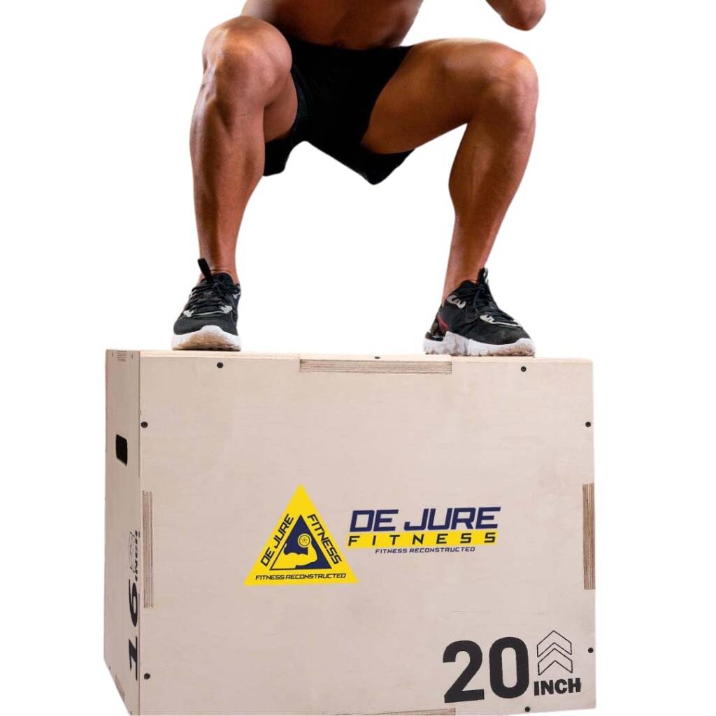 A close-up of a jump box with legs of a man on it. 