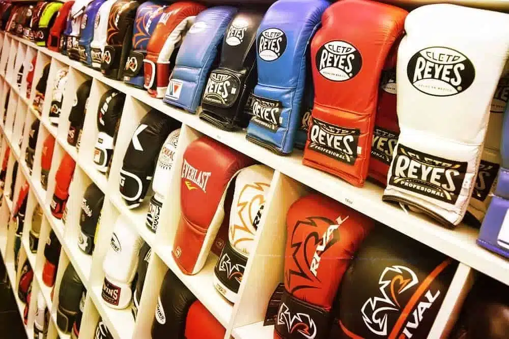 A collection of lace up boxing gloves