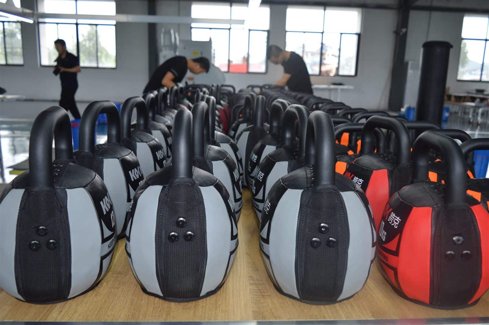 Handle wall ball batch staged for pre-shipment visual inspection